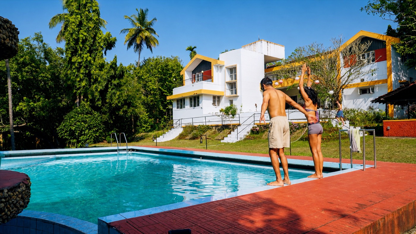 Two residents jumping into the pool together