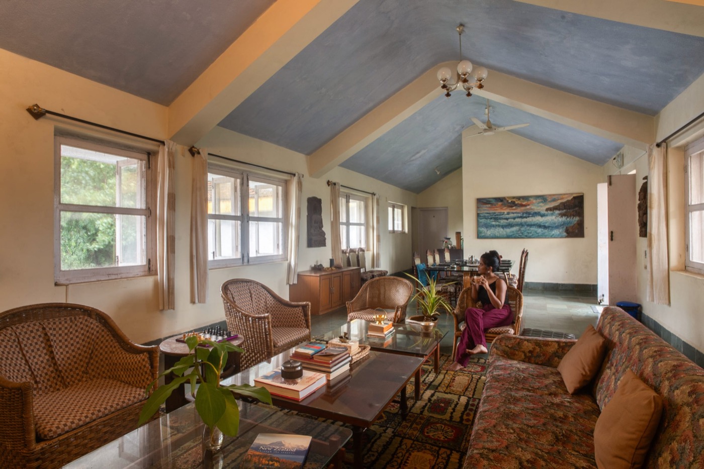 Resident reading in the upstairs lounge at Big the Bungalow
