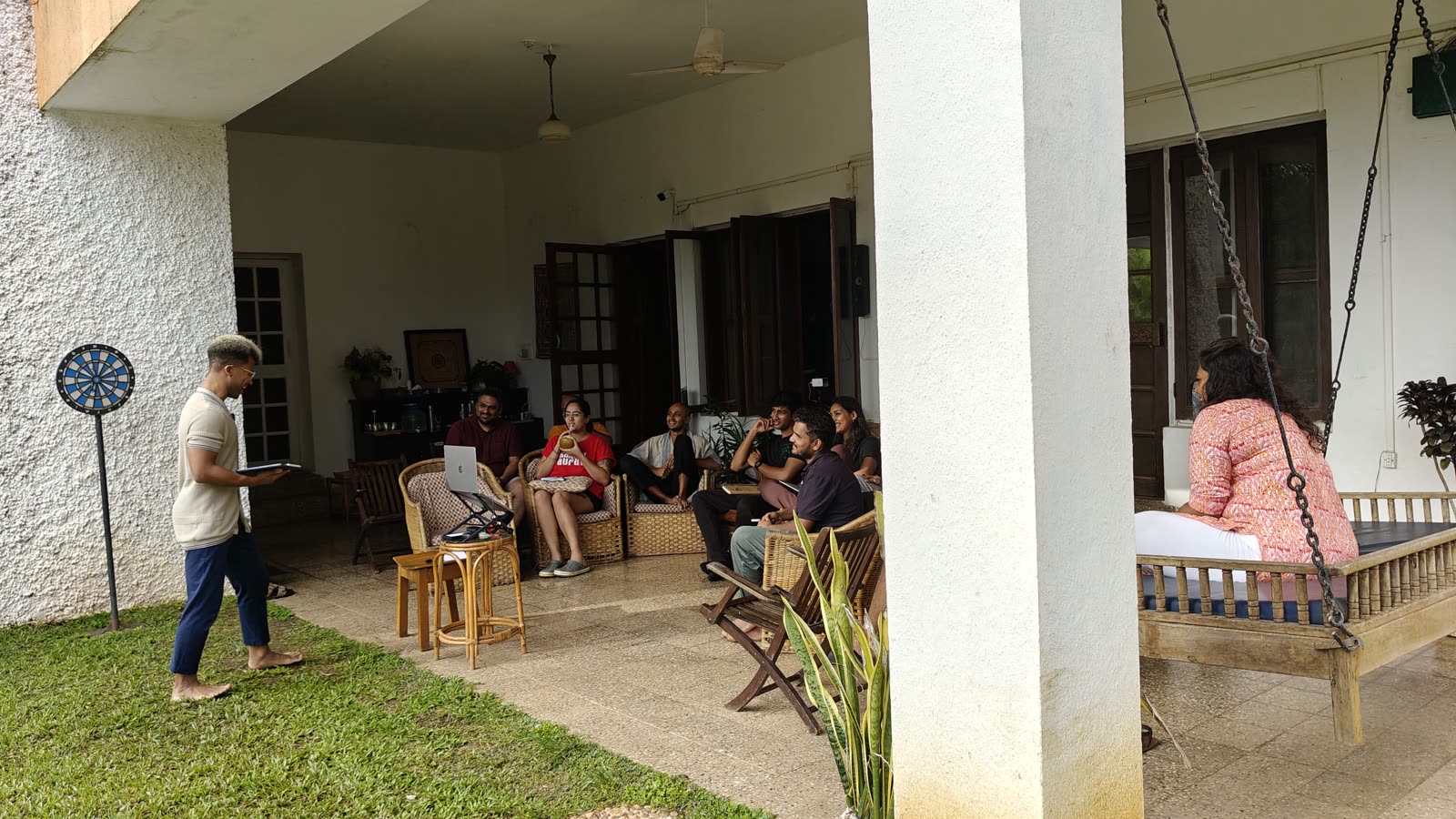 A meeting out on the porch