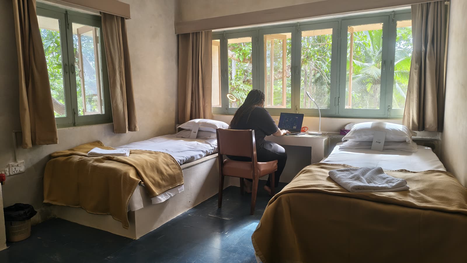 A resident working from her room