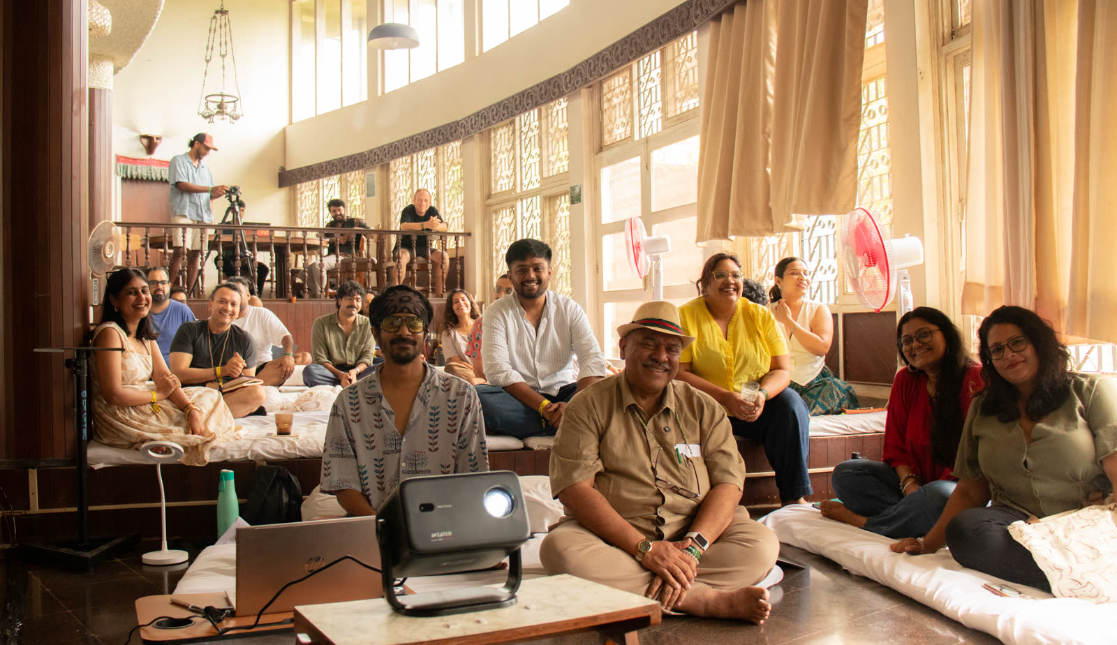 JTNF attendees smiling together in the workshop hall