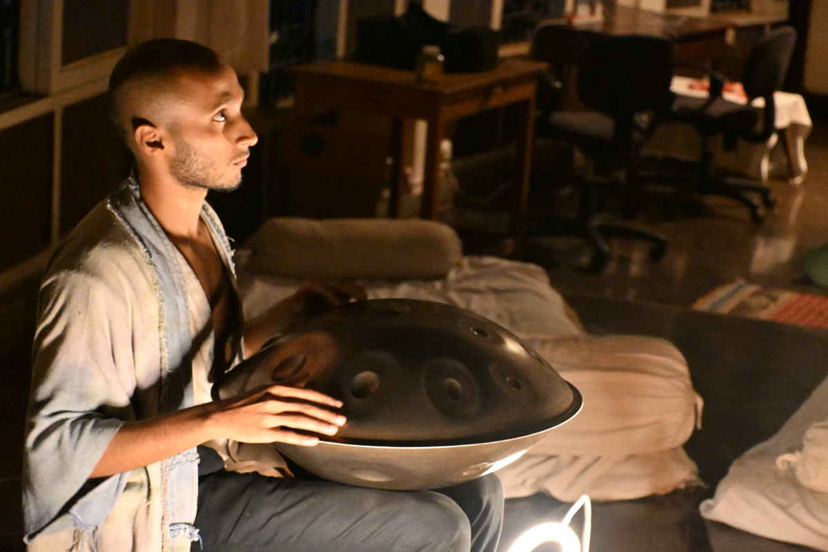 Late-night handpan jam by candlelight at Soch